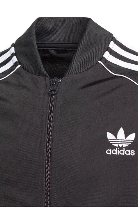 adidas vest zwart wit logo en strepen zijkant dames|adidas Dames Sweaters en Vesten .